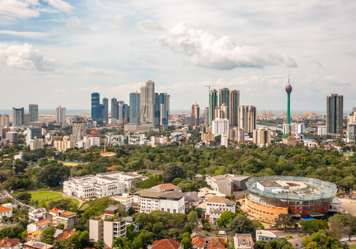 Skyline of Colombo with modern and colonial architecture.